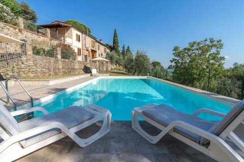 Property building, Day, Natural landscape, Pool view, Swimming pool, sunbed