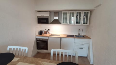 Kitchen or kitchenette, stove, kitchen