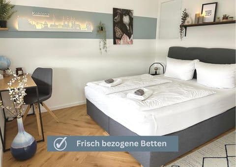 Wonderful World Apartment - stadtnah, Balkon, Parkplatz, E-Ladestation, Fitnessstudio Apartment in Koblenz