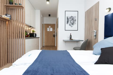 Bed, View (from property/room), Kitchen or kitchenette, minibar, stove