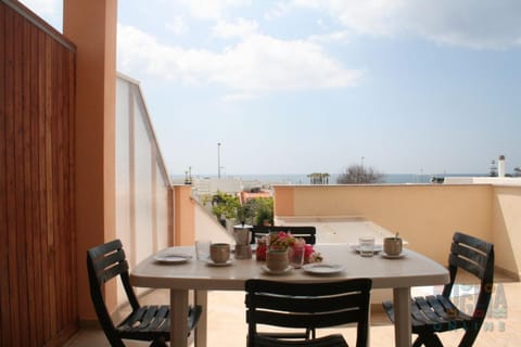 Property building, Patio, Day, Natural landscape, View (from property/room), Balcony/Terrace, Food and drinks, Dining area, Food, Sea view