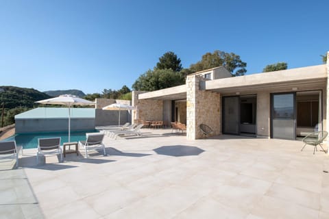 Property building, Day, Natural landscape, Pool view, Swimming pool, sunbed