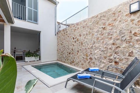 Property building, Living room, Swimming pool
