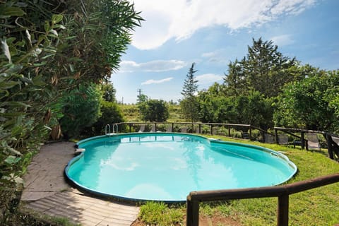 Property building, Living room, Swimming pool