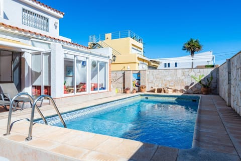Property building, Living room, Swimming pool