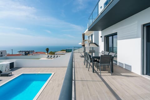 Property building, Patio, Day, Natural landscape, View (from property/room), Balcony/Terrace, Pool view, Sea view, Swimming pool, sunbed