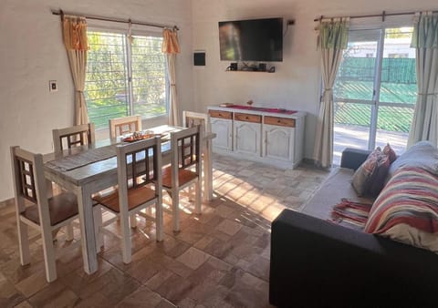 TV and multimedia, Living room, Seating area, Dining area, Garden view, fireplace