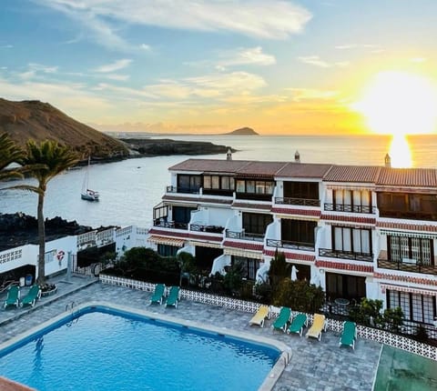 Property building, Living room, Swimming pool
