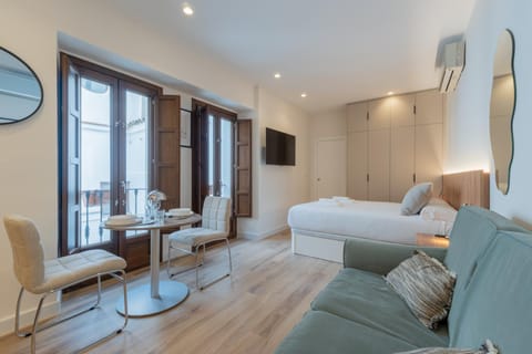 Bed, TV and multimedia, Living room, Bedroom