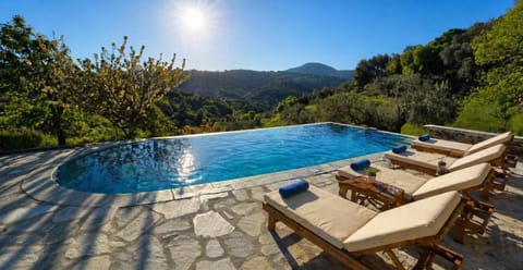 Patio, Nearby landmark, Spring, Day, Natural landscape, Mountain view, Pool view, Swimming pool, sunbed