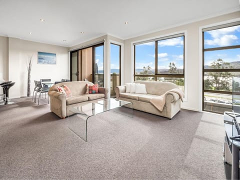 View (from property/room), Living room, Seating area, Lake view, Mountain view