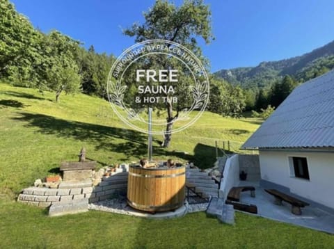 Nearby landmark, Natural landscape, Garden, Hot Tub, Seating area, Text overlay, Garden view, Mountain view