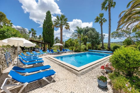 Property building, Living room, Swimming pool