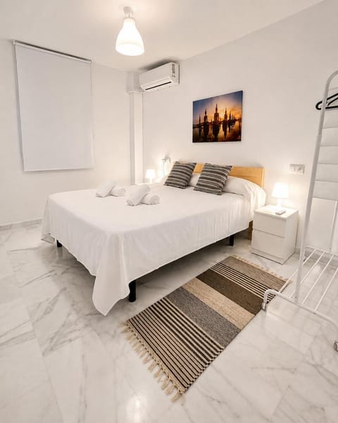 Bed, Photo of the whole room, Bedroom, towels, air conditioner