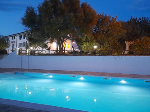 Property building, Night, Pool view, Swimming pool