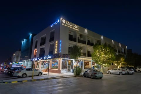Property building, Night, Neighbourhood, City view, Street view, Location, Parking