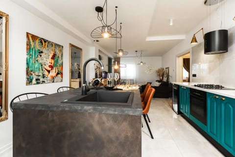 Kitchen or kitchenette, Living room, Seating area, Dining area