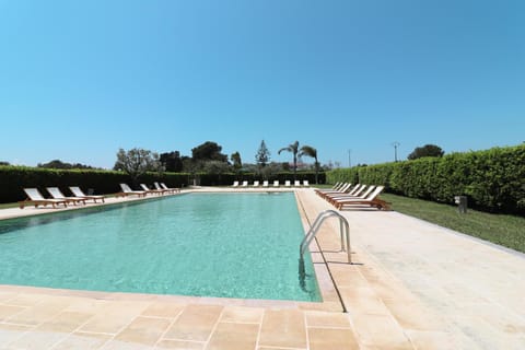 Property building, Living room, Swimming pool