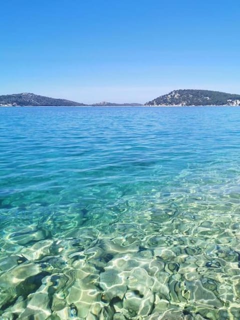 Beach front apartment with beautiful sunsets Apartment in Šibenik-Knin County, Croatia