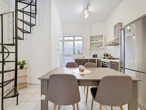 Kitchen or kitchenette, Living room, Seating area, Dining area, oven, stove, toaster