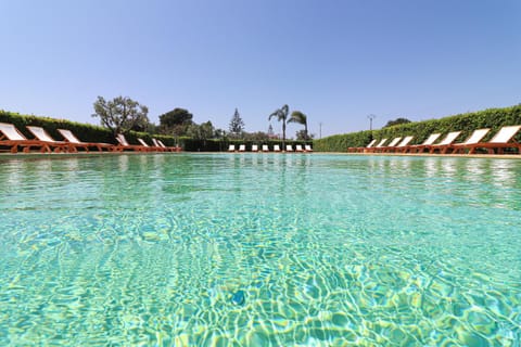 Property building, Living room, Swimming pool