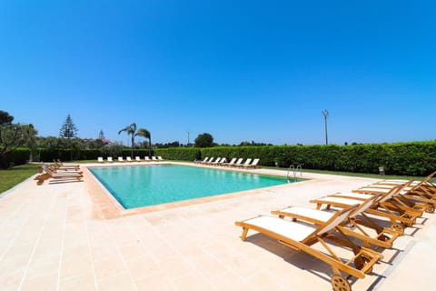 Property building, Living room, Swimming pool
