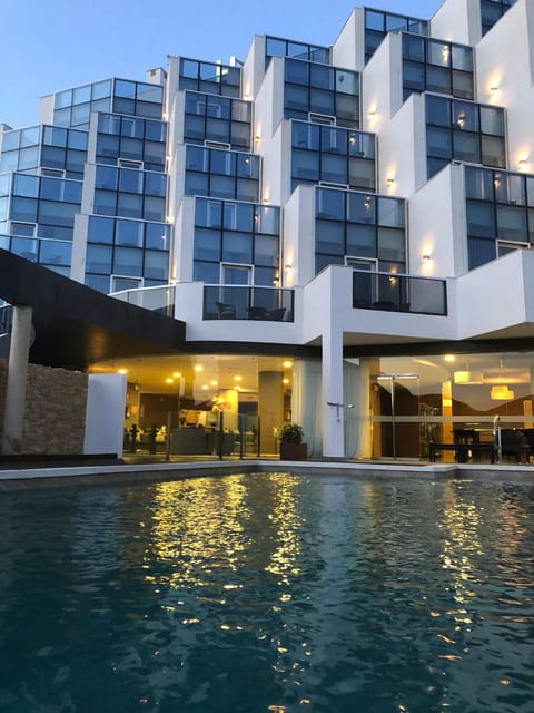 Property building, Restaurant/places to eat, Night, Pool view, Swimming pool, Sunset