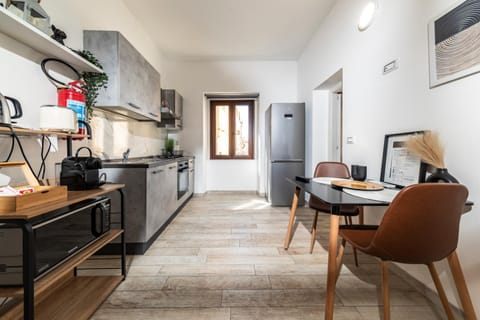 Kitchen or kitchenette, Living room, Dining area, oven, toaster, air conditioner