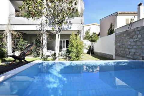 Property building, Garden, Pool view, Swimming pool