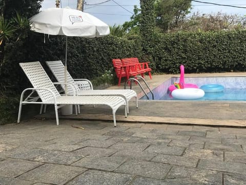 Swimming pool, sunbed