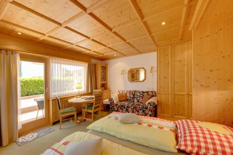 Bed, Living room, Seating area, Dining area, Bedroom