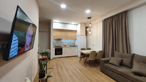 Kitchen or kitchenette, Living room, Seating area, Dining area