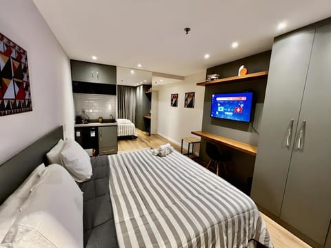 TV and multimedia, Kitchen or kitchenette, Living room, Photo of the whole room, Seating area, Bedroom, hair dresser, wardrobe