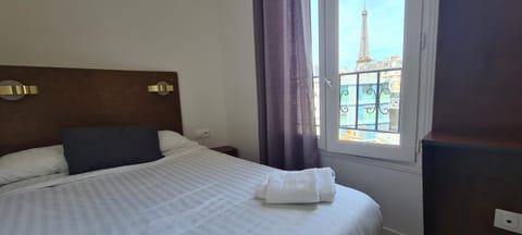 Bed, Photo of the whole room, Bedroom, Landmark view, Landmark view, towels