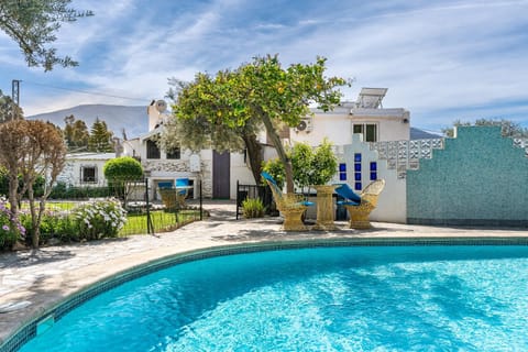 Property building, Living room, Swimming pool