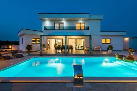 Property building, Patio, Swimming pool