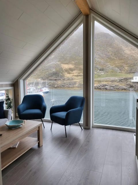 View (from property/room), Living room, Seating area, Mountain view, Sea view