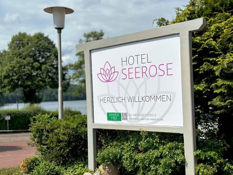 Day, Property logo or sign, Natural landscape, Logo/Certificate/Sign, Text overlay, Street view, Certificate/Award