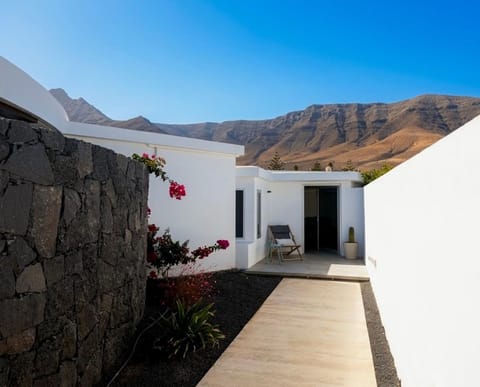 Property building, Off site, Day, Natural landscape, Lobby or reception, Beach, Mountain view