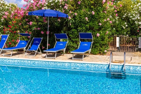 Property building, Living room, Swimming pool