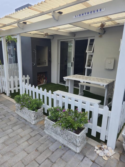 Property building, Patio, BBQ facilities, Balcony/Terrace