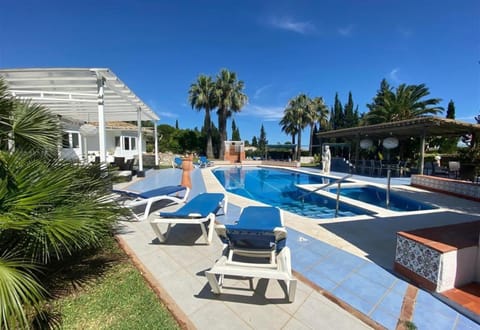 Property building, Living room, Swimming pool
