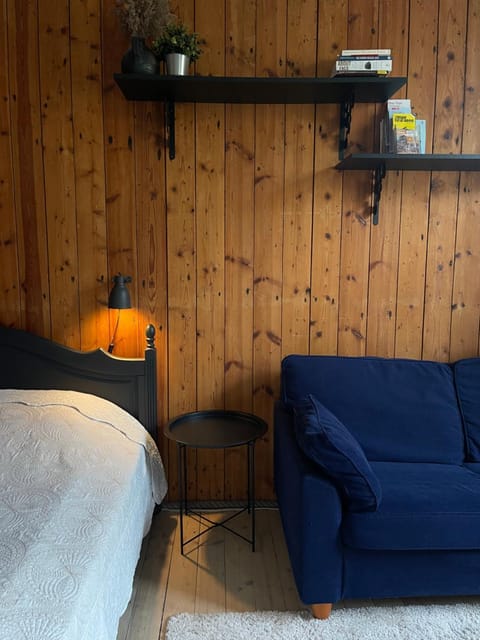 Bed, Living room, Seating area