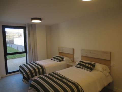 Bed, Off site, Bedroom, Garden view, locker, towels