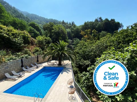 Natural landscape, Mountain view, Pool view, Swimming pool, Certificate/Award, sunbed