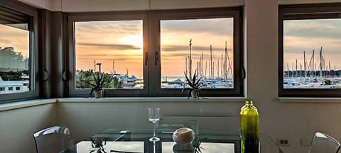 Property building, Natural landscape, Dining area, Sea view, Sunset