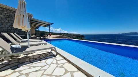 Property building, View (from property/room), Balcony/Terrace, Pool view, Sea view, sunbed