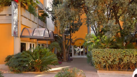 Property building, Facade/entrance, Property logo or sign, Garden