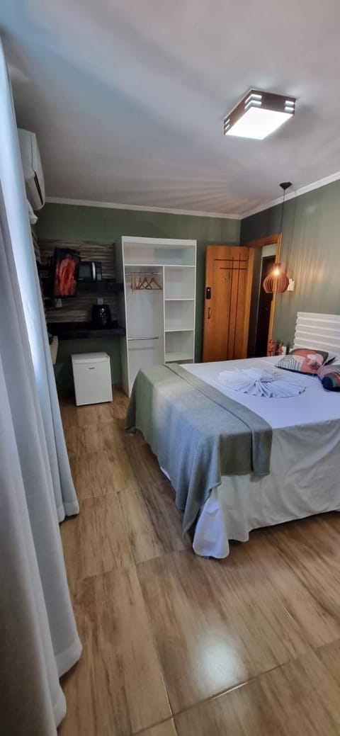 Bed, towels, air conditioner