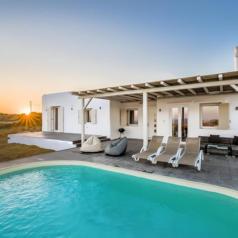 Property building, Seating area, Swimming pool, sunbed
